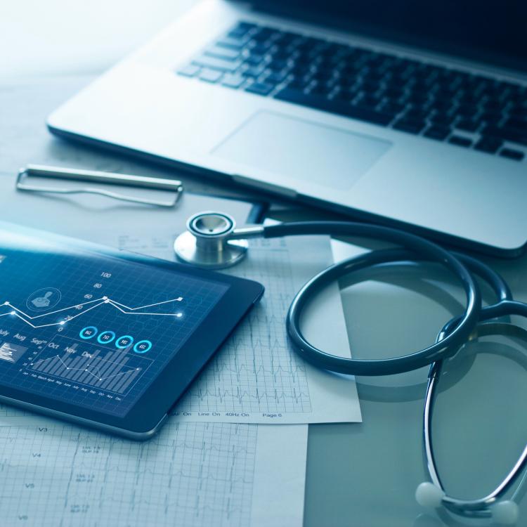 tablet and data on table