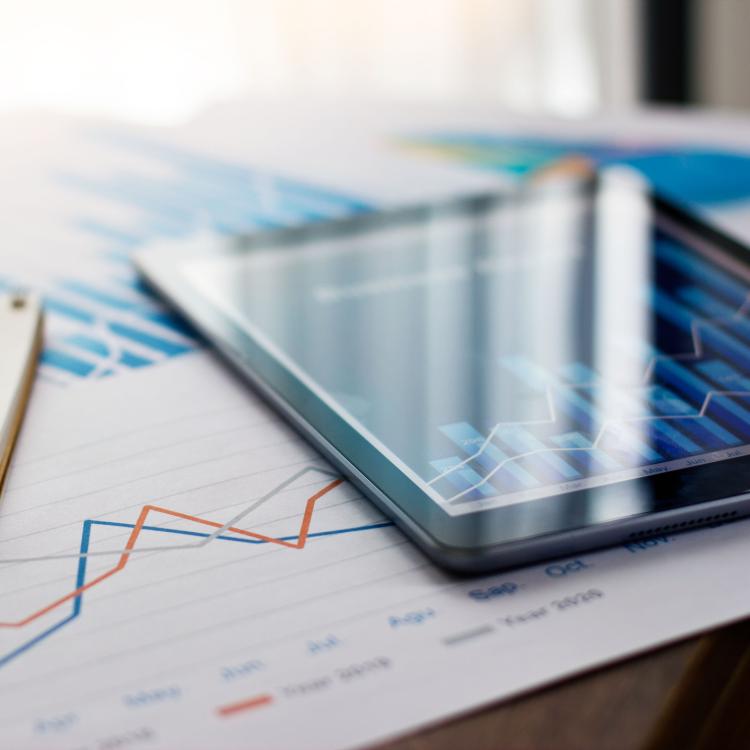 tablet and data on table