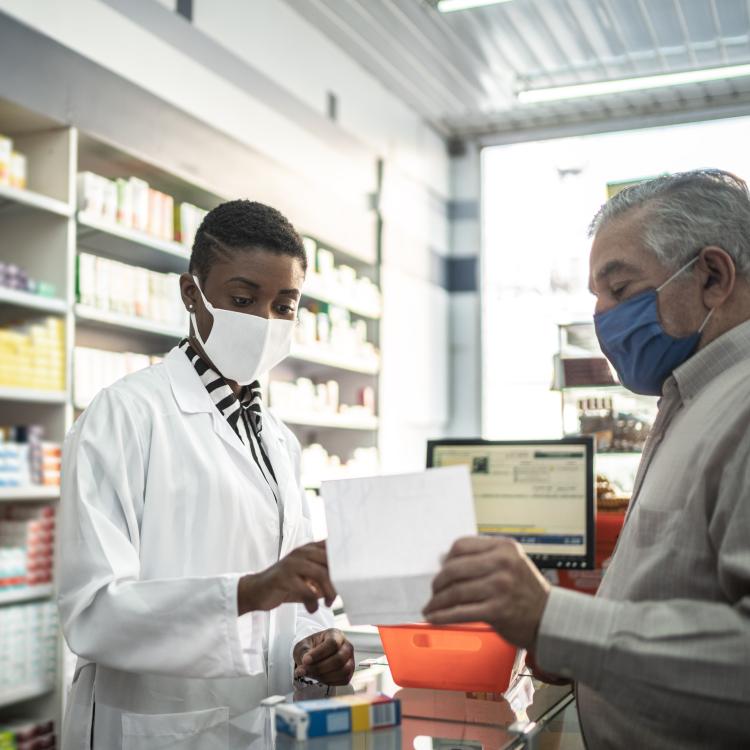 Pharmacist with Patient