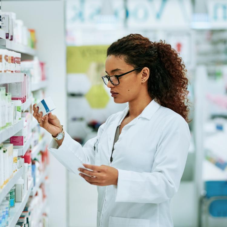 Hospital pharmacist selecting medications