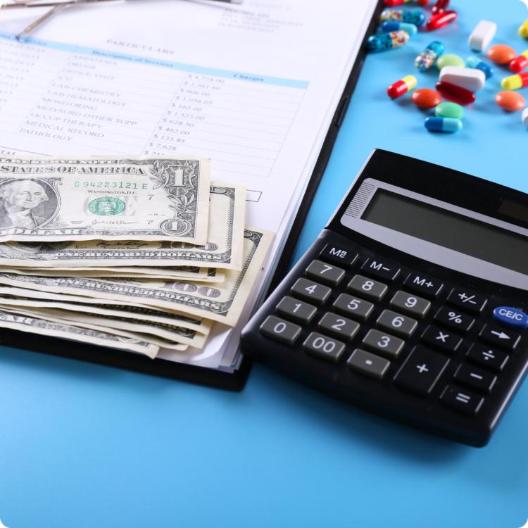 Desk with medicines and calculator